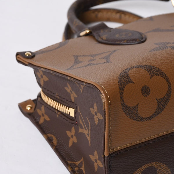 New and unused LOUIS VUITTON On the Go EW 2WAY bag M46653 Monogram Giant Reverse Brown Used 4a000739