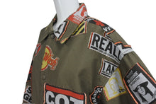 Load image into Gallery viewer, [USED/中古]DOUBLET ジャケット 17SS04BL34 STICKERS JAQUARD COAH JACKET  カーキ コットン S Bランク 中古 4c071560