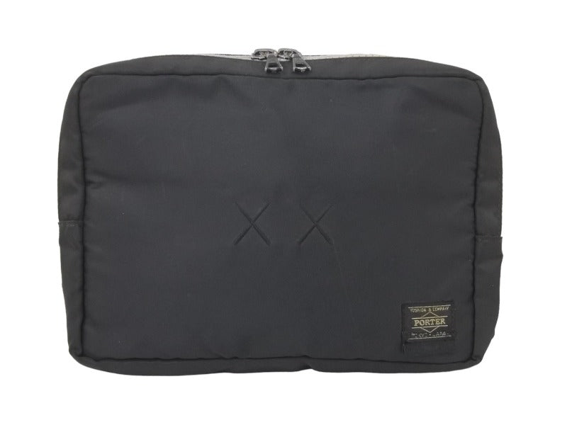 PORTER × KAWS ポーター カウズ ポーチ カバン クラッチ ロゴ ナイロン ブラック メンズ 中古 N33152 – Casanova  Vintage