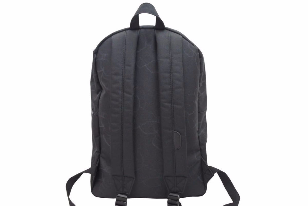 KAWS : HOLIDAY カウズ herschel ハーシェル リュック バックパック コラボ ブラック ユニセックス バッグ 美品 38379