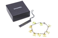 Load image into Gallery viewer, CHANEL シャネル ヴィンテージ ブレスレット ココマーク シルバーチェーン チャームブレスレット イエロー 美品 中古 43928