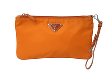 Load image into Gallery viewer, PRADA プラダ ポーチ 1NH545 ストラップ付き TESSUTO アランチョ ナイロン プレートロゴ オレンジ シルバー金具 美品 中古 54425