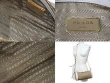 Load image into Gallery viewer, PRADA プラダ ドラム型ショルダ－バッグ キャンバス レザー リボン ベージュ ホワイト ゴールド金具 美品 中古 56933