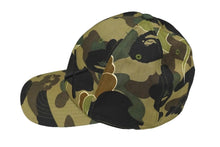 Load image into Gallery viewer, A BATHING APE アベイシングエイプ キャップ 1stカモ オリーブドラブ KAWS カウズ 2005 グリーン コットン M 美品 中古 59586